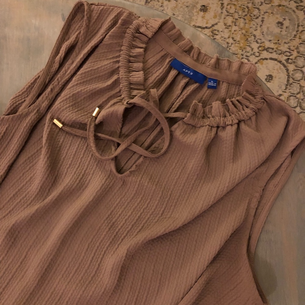 Beautiful tan sleeveless blouse size L